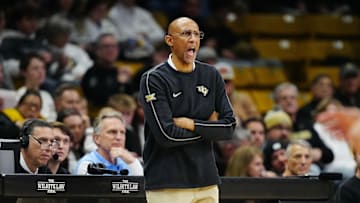 Feb 15, 2025; Boulder, Colorado, USA; UCF Knights head coach Johnny Dawkins calls out in the first half against the Colorado Buffaloes at the CU Events Center. Mandatory Credit: Ron Chenoy-Imagn Images
