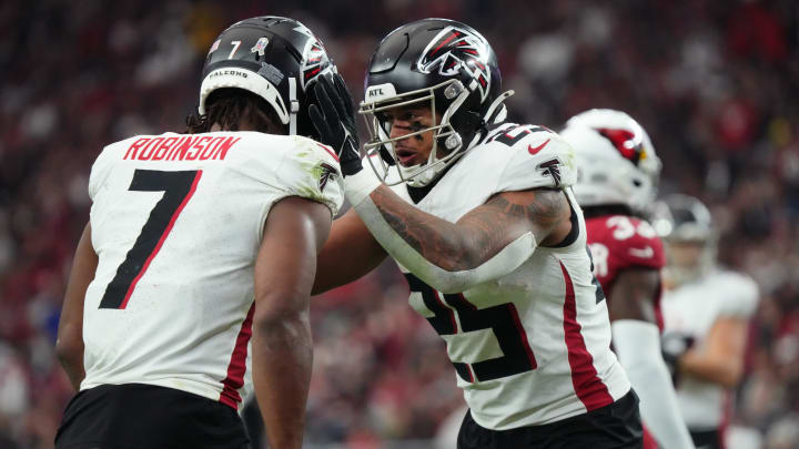 Atlanta Falcons running backs Bijan Robinson and Tyler Allgeier will take their athletic talents to the American Cornhole League on June 22 in Milwaukee.