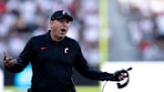 Cincinnati Bearcats head coach Scott Satterfield speaks to the referees in the fourth quarter of the NCAA football game between the Cincinnati Bearcats and Bowling Green Falcons at Nippert Stadium in Cincinnati on Sept. 6, 2025.