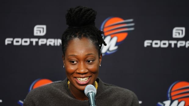 A photo of Tina Charles after signing with the Mercur