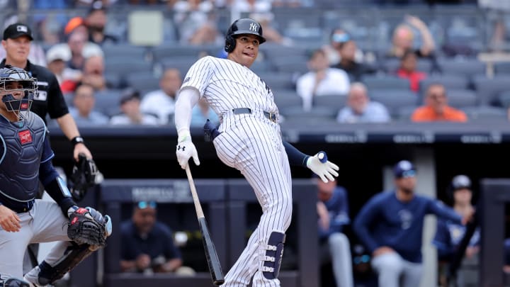 Jul 22, 2024; Bronx, New York, USA; New York Yankees right fielder Juan Soto (22) watches his solo home run against the Tampa Bay Rays during the seventh inning at Yankee Stadium. Mandatory Credit: Brad Penner-USA TODAY Sports