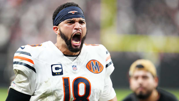 Chicago Bears quarterback Caleb Williams (18) celebrates