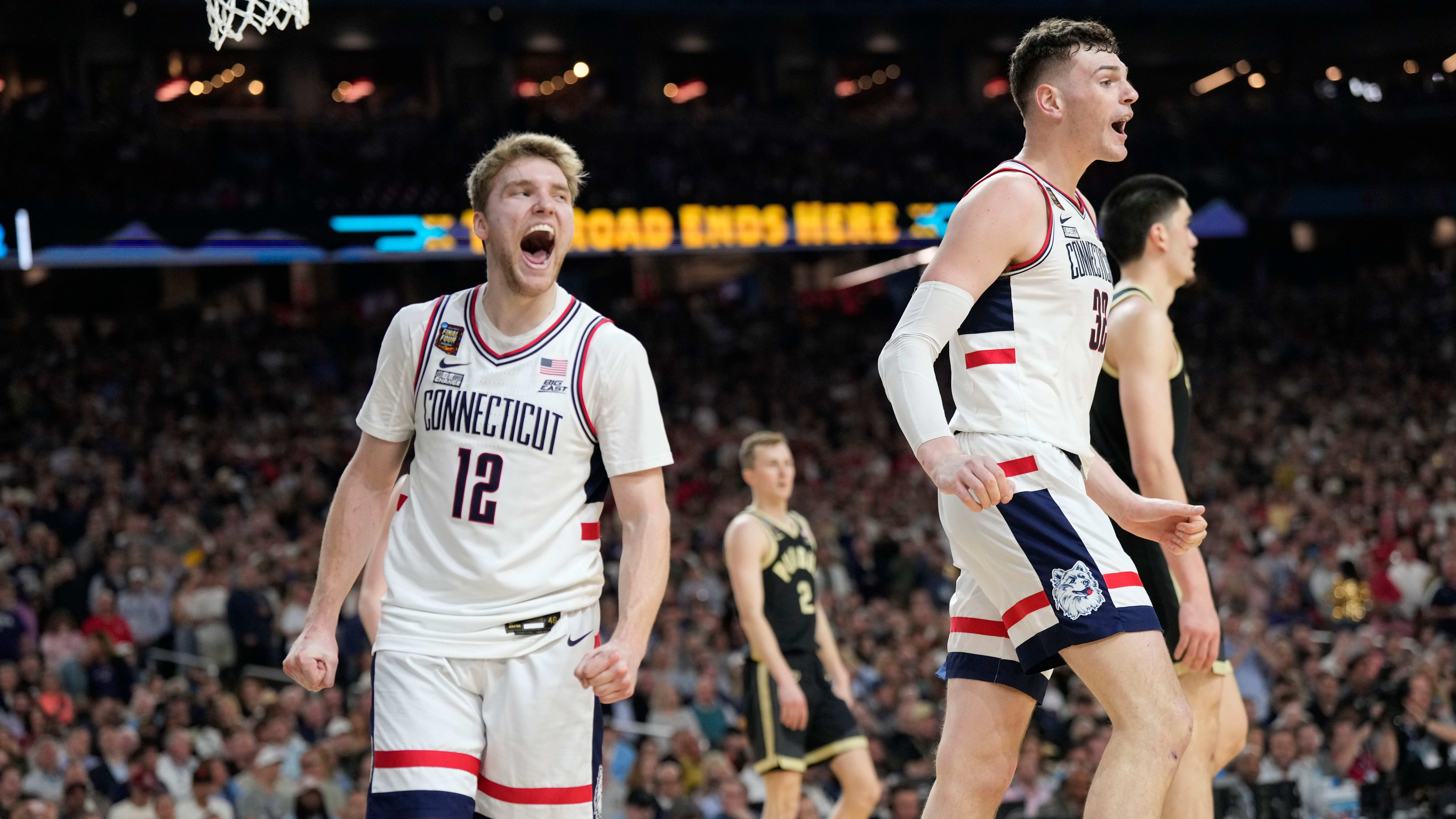 Spencer and Clingan react after a play on Monday against Purdue.