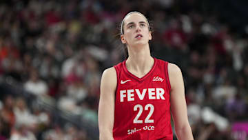 Indiana Fever guard Caitlin Clark reacts during the during the first half of a game against the Las Vegas Aces at T-Mobile Arena.