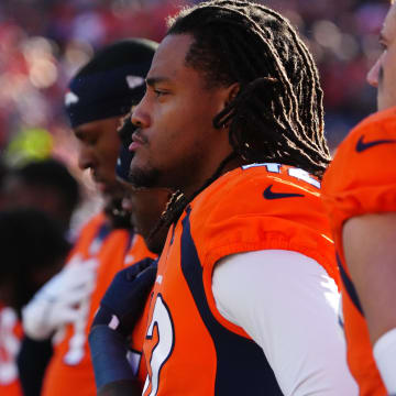 Nov 26, 2023; Denver, Colorado, USA; Denver Broncos linebacker Nik Bonitto (42) looks on before the game against the Cleveland Browns at Empower Field at Mile High. Mandatory Credit: Ron Chenoy-USA TODAY Sports