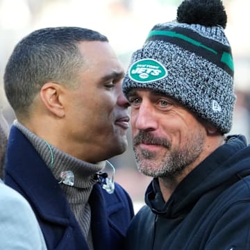 Tony Gonzalez (left) and Aaron Rodgers after a Jets game in 2023