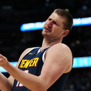 Apr 10, 2024; Denver, Colorado, USA; Denver Nuggets center Nikola Jokic (15) reacts in the second half against the Minnesota Timberwolves at Ball Arena. Mandatory Credit: Ron Chenoy-USA TODAY Sports