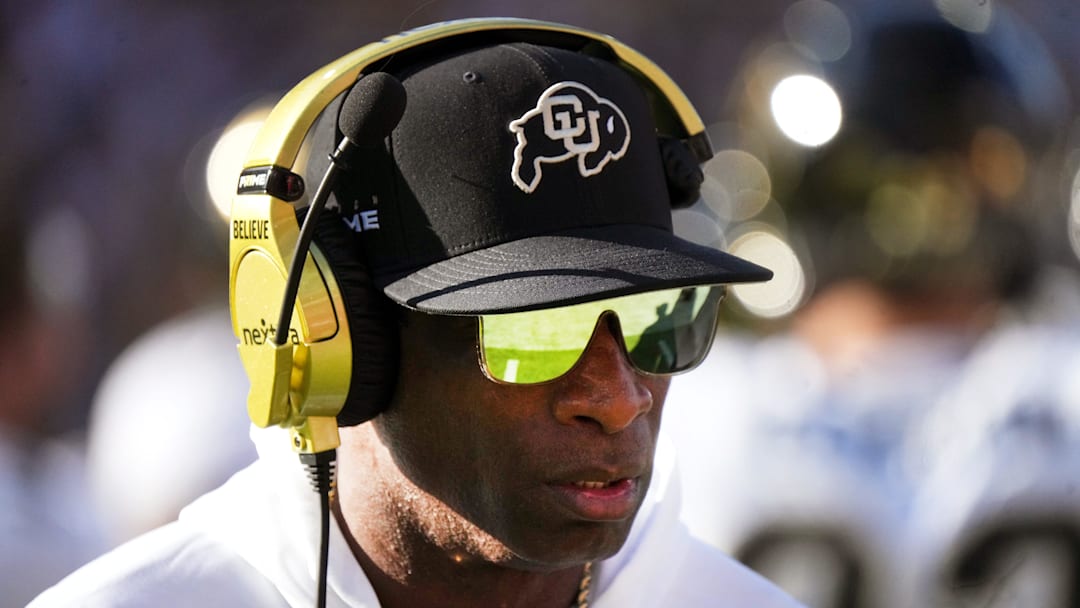 Colorado Buffaloes head coach Deion Sanders walks the sidelines as his team takes on the ASU Sun Devils at Mountain America Stadium in Tempe on Oct. 7, 2023.