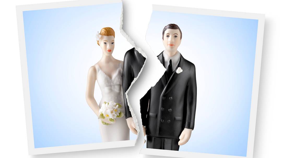 Torn photograph of wedding cake topper. Torn photograph of wedding cake topper.