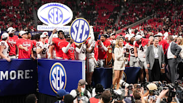 Dec 6, 2025; Atlanta, GA, USA; Georgia Bulldogs celebrate winning the SEC Championship against the Alabama Crimson Tide during the 2025 SEC Championship game at Mercedes-Benz Stadium. Mandatory Credit: Dale Zanine-Imagn Images