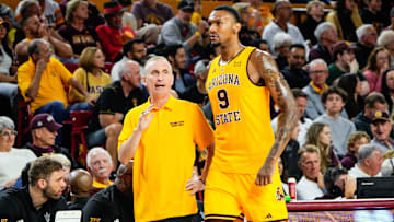 Arizona State Sun Devils head coach Bobby Hurley talks to center Shawn Phillips Jr (9) during the second half against the Texas Tech Red Raiders at Desert Financial Arena.