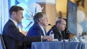 North Carolina Tar Heels chancellor Lee Roberts, new head coach Bill Belichick and athletic director Bubba Cunningham