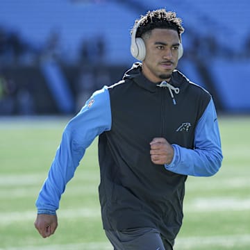 Dec 22, 2024; Charlotte, North Carolina, USA;  Carolina Panthers quarterback Bryce Young (9) during pregame warmups against the Arizona Cardinals at Bank of America Stadium. Mandatory Credit: Jim Dedmon-Imagn Images