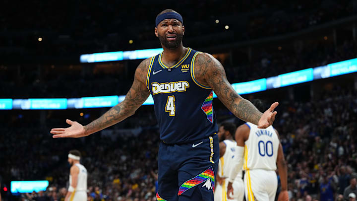 Denver Nuggets center DeMarcus Cousins reacts to a foul in the second quarter against the Golden State Warriors of the first round for the 2022 NBA playoffs at Ball Arena. Denver Nuggets center DeMarcus Cousins reacts to a foul in the second quarter against the Golden State Warriors of the first round for the 2022 NBA playoffs at Ball Arena.