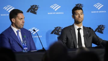 Feb 1, 2024; Charlotte, NC, USA;  Carolina Panthers head coach Dave Canales speaks to the media as general manager Dan Morgan looks on during the introductory press conference at Bank of America Stadium. Mandatory Credit: Jim Dedmon-USA TODAY Sports