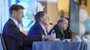 North Carolina Tar Heels chancellor Lee Roberts, new head coach Bill Belichick and athletic director Bubba Cunningham 