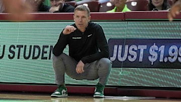 Nov 17, 2023; Charleston, SC, USA; North Texas Mean Green head coach Ross Hodge on the side line in the first half against the LSU Tigers at TD Arena. Mandatory Credit: David Yeazell-Imagn Images