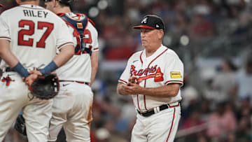 Sep 6, 2023; Cumberland, Georgia, USA; Atlanta Braves manager Brian Snitker (43) walks to the mound to remove starting pitcher Spencer Strider (99) (not shown) from the game against the St. Louis Cardinals during the third inning at Truist Park. Mandatory Credit: Dale Zanine-Imagn Images