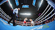 Sep 17, 2022; Las Vegas, Nevada, USA; Canelo Alvarez (red trunks) and Gennadiy Golovkin (white trunks) box during a middleweight championship bout at T-Mobile Arena. Mandatory Credit: Joe Camporeale-Imagn Images