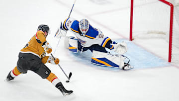 Jan 20, 2025; Las Vegas, Nevada, USA; Vegas Golden Knights left wing Pavel Dorofeyev (16) looks to shoot against St. Louis Blues goaltender Jordan Binnington (50) during a shoot out at T-Mobile Arena. Mandatory Credit: Stephen R. Sylvanie-Imagn Images