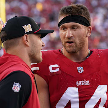 Sep 9, 2024; Santa Clara, California, USA; San Francisco 49ers fullback Kyle Juszczyk (44) talks with running back Christian McCaffrey (23) on the sideline during the second quarter against the New York Jets at Levi's Stadium. Mandatory Credit: David Gonzales-Imagn Images