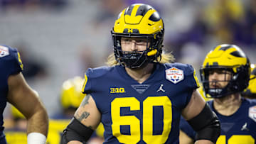 Dec 31, 2022; Glendale, Arizona, USA; Michigan Wolverines offensive lineman Connor Jones (60) against the TCU Horned Frogs during the 2022 Fiesta Bowl at State Farm Stadium.