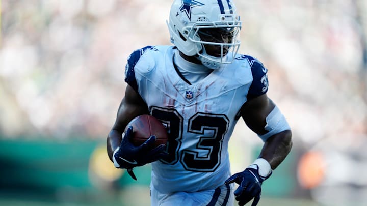 Dallas Cowboys running back Javonte Williams runs into the end zone an after completing a pass, for another touchdown.