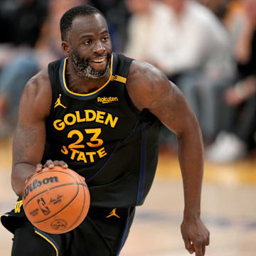 May 12, 2025; San Francisco, California, USA; Golden State Warriors forward Draymond Green (23) dribbles the ball against the Minnesota Timberwolves in the fourth quarter during game four of the second round for the 2025 NBA Playoffs at Chase Center. Mandatory Credit: Cary Edmondson-Imagn Images