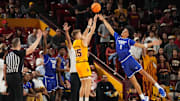 ASU Sun Devils guard Noah Meeusen (15) shoots over Georgia State Panthers forward Isaiah Sherrard (8) at Desert Financial Arena on Nov. 17, 2025.