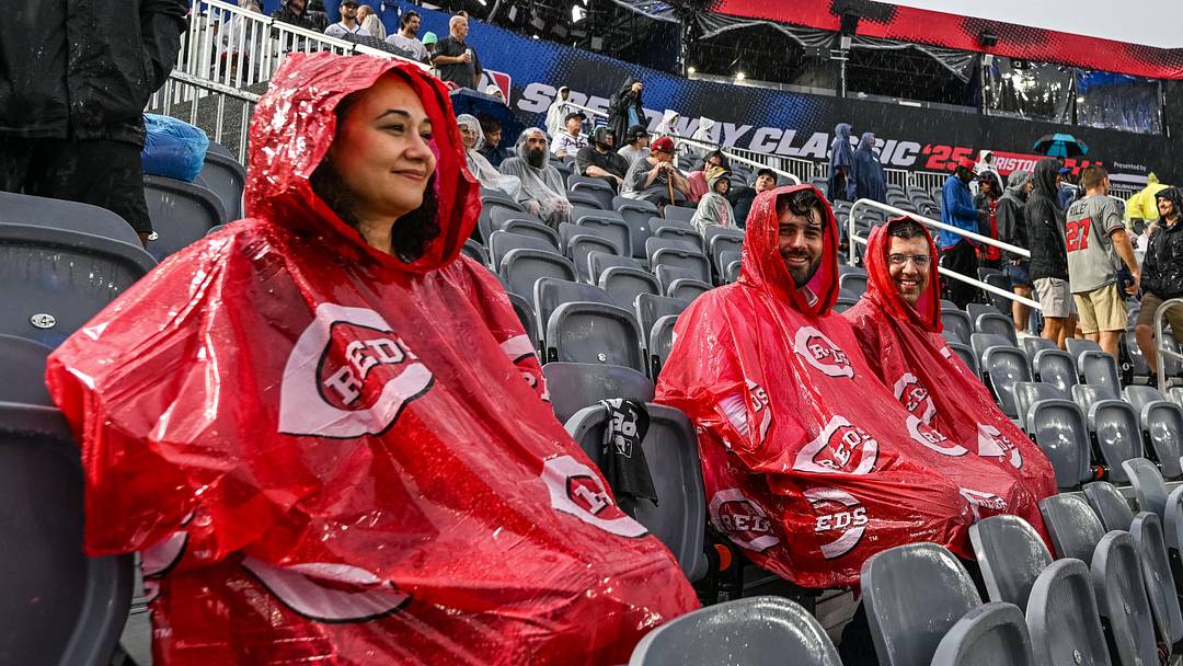 Aug 2, 2025; Bristol, Tennessee, USA; Fans look on as rain delays the start of the Speedway Classic game between the Cincinnati Reds and the Atlanta Braves at Bristol Motor Speedway. Mandatory Credit: Bryan Lynn-Imagn Images