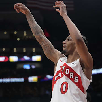 Mar 10, 2025; Toronto, Ontario, CAN; Toronto Raptors guard AJ Lawson (0) reacts after making a three point basket against the Washington Wizards during the second half at Scotiabank Arena. Mandatory Credit: John E. Sokolowski-Imagn Images