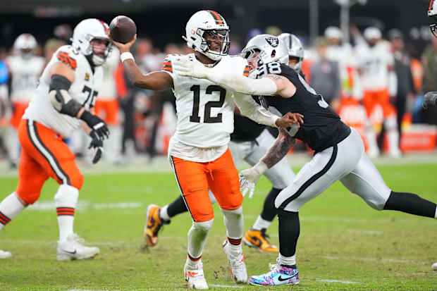 Nov 23, 2025; Paradise, Nevada, USA; Cleveland Browns quarterback Shedeur Sanders (12) looks to make a pass attempt as Las Ve