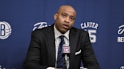 Jan 25, 2025; Brooklyn, New York, USA; Former NBA star Vince Carter speaks at a jersey retirement press conference before a game between the Brooklyn Nets and the Miami Heat at Barclays Center. Mandatory Credit: John Jones-Imagn Images