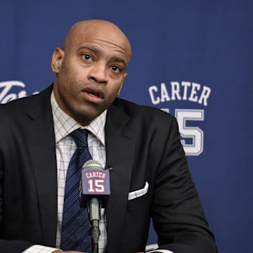 Jan 25, 2025; Brooklyn, New York, USA; Former NBA star Vince Carter speaks at a jersey retirement press conference before a game between the Brooklyn Nets and the Miami Heat at Barclays Center. Mandatory Credit: John Jones-Imagn Images