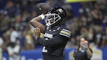 Dec 28, 2024; San Antonio, TX, USA; Colorado Buffaloes quarterback Shedeur Sanders (2) warms up before the game against the Brigham Young Cougars at Alamodome. Mandatory Credit: Troy Taormina-Imagn Images