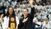 Jan 27, 2024; Storrs, Connecticut, USA; WNBA player and former UConn Huskies player Diana Taurasi waves to the crowd as she and other players are recognized for their championship wins at UConn before the start of the game against the Notre Dame Fighting Irish at Harry A. Gampel Pavilion. Mandatory Credit: David Butler II-Imagn Images