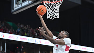 Nov 21, 2024; Spokane, Washington, USA; Washington State Cougars guard Cedric Coward (0) makes an easy lay up against the Eastern Washington Eagles in the first half at Spokane Veterans Memorial Arena. Mandatory Credit: James Snook-Imagn Images