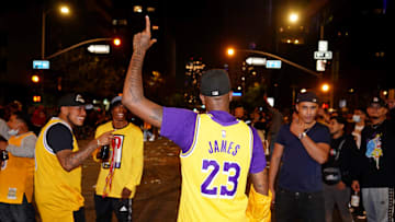 Fans celebrate after the Los Angeles Lakers won the 2020 NBA finals against the Miami Heat around Staples Center