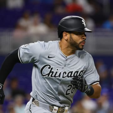 Jul 5, 2024; Miami, Florida, USA; Chicago White Sox right fielder Tommy Pham (28) runs toward first base after hitting a single against the Miami Marlins during the seventh inning at loanDepot Park.