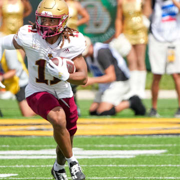 Sep 14, 2024; Columbia, Missouri, USA; Boston College Eagles wide receiver Lewis Bond (11) runs the ball against the Missouri Tigers during the first half at Faurot Field at Memorial Stadium. Mandatory Credit: Denny Medley-Imagn Images