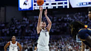 Nov 3, 2025; Storrs, Connecticut, USA; UConn Huskies forward Alex Karaban (11) shoots a free-throw against the New Haven Chargers in the second half at Harry A. Gampel Pavilion. Mandatory Credit: David Butler II-Imagn Images