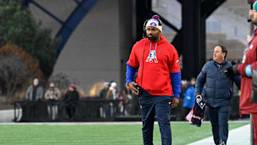 Dec 1, 2024; Foxborough, Massachusetts, USA; New England Patriots head coach Jerod Mayo watches game action from the sideline during the second half against the Indianapolis Colts at Gillette Stadium. Mandatory Credit: Eric Canha-Imagn Images