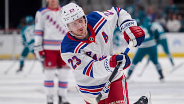 Mar 29, 2025; San Jose, California, USA; New York Rangers defenseman Adam Fox (23) warms up before the game against the San Jose Sharks at SAP Center at San Jose. Mandatory Credit: Robert Edwards-Imagn Images