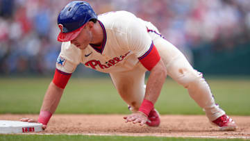 Philadelphia Phillies outfielder Max Kepler (17) dives back to first against the Pittsburgh Pirates in the fifth inning at Citizens Bank Park.