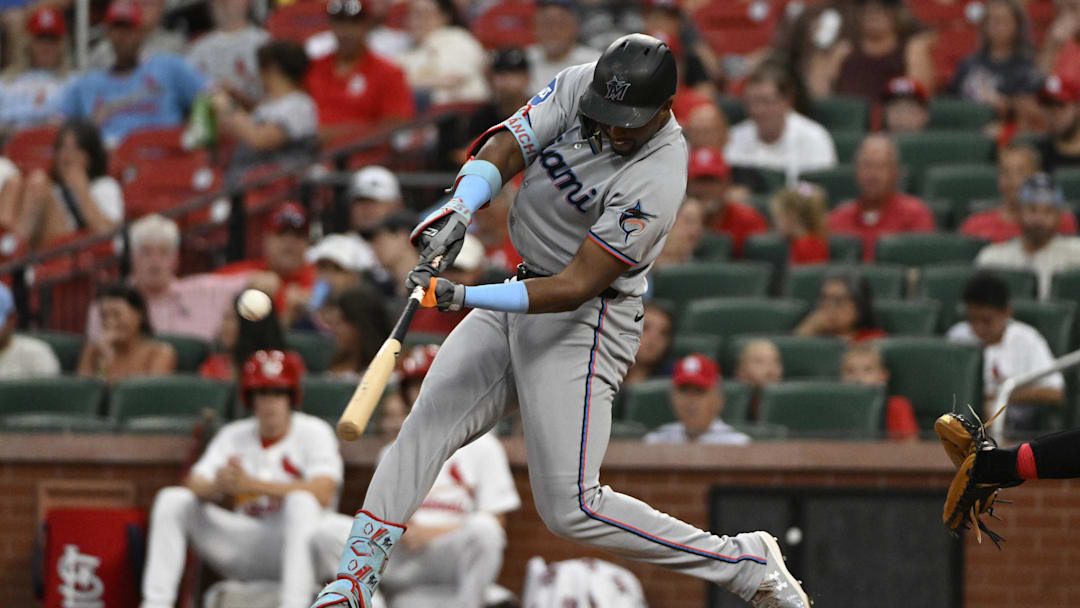 Jul 30, 2025; St. Louis, Missouri, USA; Miami Marlins outfielder Jesus Sanchez (7) hits a two-run home run against the St. Louis Cardinals during the third inning at Busch Stadium. Mandatory Credit: Jeff Le-Imagn Images