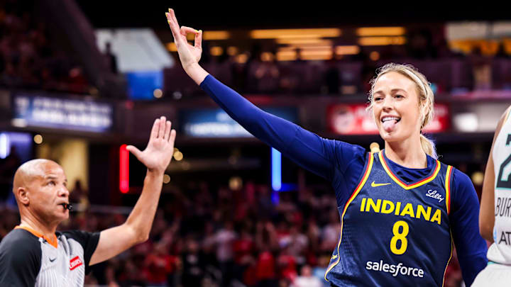 Indiana Fever guard Sophie Cunningham (8) celebrates a 3-pointer Saturday, June 14, 2025, during a game between the Indiana Fever and the New York Liberty at Gainbridge Fieldhouse in Indianapolis. The Indiana Fever defeated the New York Liberty, 102-88. Indiana Fever guard Sophie Cunningham (8) celebrates a 3-pointer Saturday, June 14, 2025, during a game between the Indiana Fever and the New York Liberty at Gainbridge Fieldhouse in Indianapolis. The Indiana Fever defeated the New York Liberty, 102-88.