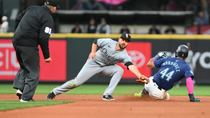 Chicago White Sox shortstop Paul DeJong (29) misses the tag on Seattle Mariners center fielder Julio Rodriguez (44) for a stolen base during the fifth inning at T-Mobile Park in June.