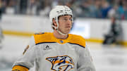 Jan 23, 2025; San Jose, California, USA;  Nashville Predators defenseman Spencer Stastney (24) before the start of the game against the San Jose Sharks at SAP Center at San Jose. Mandatory Credit: Neville E. Guard-Imagn Images