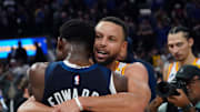 Dec 8, 2024; San Francisco, California, USA;  Golden State Warriors guard Stephen Curry (30) hugs Minnesota Timberwolves guard Anthony Edwards (5) at the end of the game at Chase Center. Mandatory Credit: David Gonzales-Imagn Images