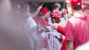 Jun 8, 2025; Cincinnati, Ohio, USA; Cincinnati Reds second baseman Matt McLain (9) celebrates with teammates after hitting a two-run home run against the Arizona Diamondbacks in the seventh inning at Great American Ball Park. Mandatory Credit: Aaron Doster-Imagn Images